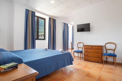Habitación Cuádruple del hotel Hospedería Santuari de Lluc