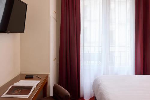 Habitación Individual Estándar del hotel Timhotel Tour Montparnasse. Foto 4