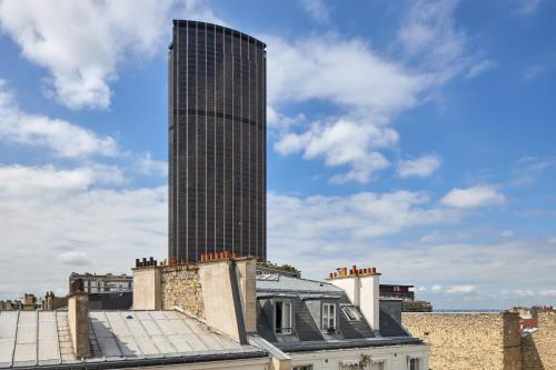 Habitación Triple Superior del hotel Timhotel Tour Montparnasse. Foto 5