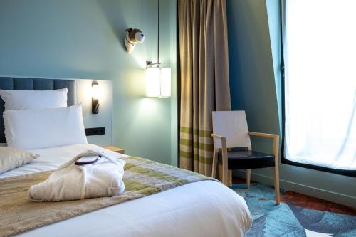 Habitación Doble Privilege con vistas del hotel Mercure Amiens Cathedrale. Foto 8