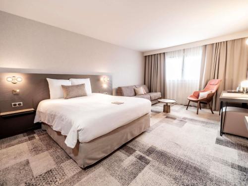 Habitación Doble Privilege con vistas al jardín del hotel Mercure Bordeaux Lac. Foto 1