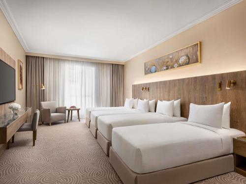 Habitación Superior con vistas parciales a Haram del hotel Mövenpick and Residence Hajar Tower Makkah. Foto 1