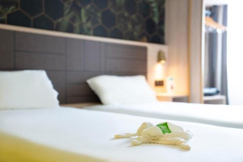 Habitación Familiar con 2 camas dobles del hotel Ibis Styles Strasbourg Nord Palais des Congrès. Foto 2
