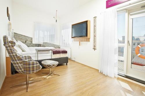 Habitación doble con balcón del hotel Reykjavik Marina - Berjaya Iceland Hotels. Foto 3