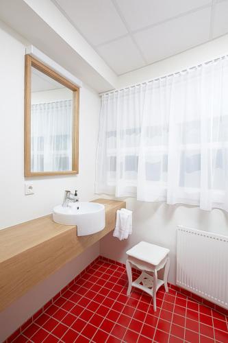 Suite con vistas al mar - Cama extragrande del hotel Reykjavik Marina - Berjaya Iceland Hotels. Foto 1