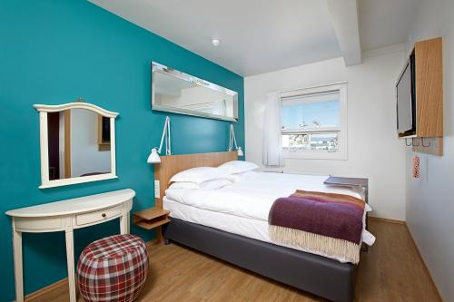 Suite con vistas al mar - Cama extragrande del hotel Reykjavik Marina - Berjaya Iceland Hotels. Foto 4