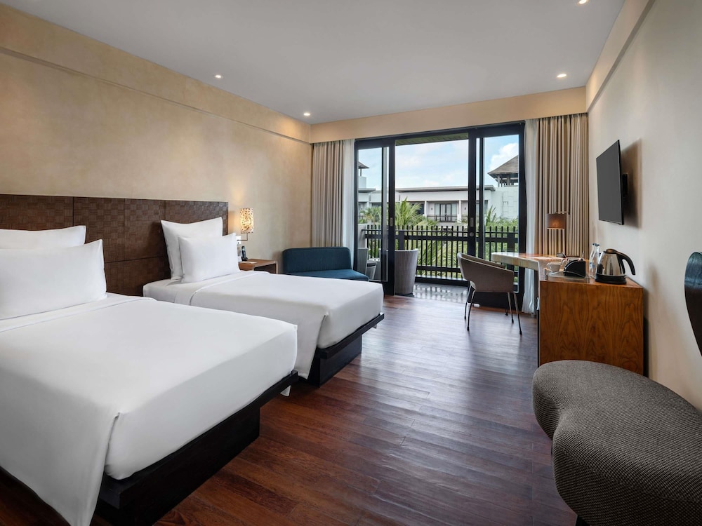 Habitación Deluxe, 2 camas individuales, vistas al jardín del hotel Pullman Bali Legian Beach