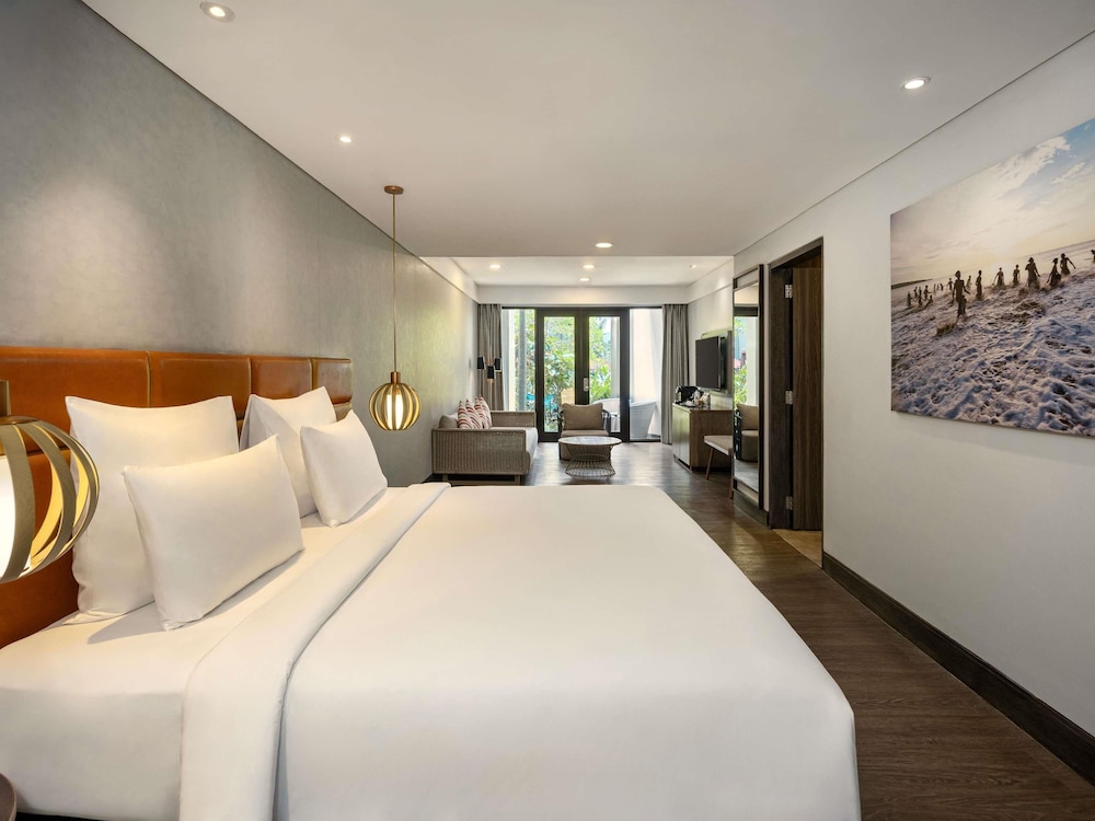 HABITACIÓN DELUXE PREMIUM, 1 Cama King Size, Vistas al Jardín del hotel Pullman Bali Legian Beach