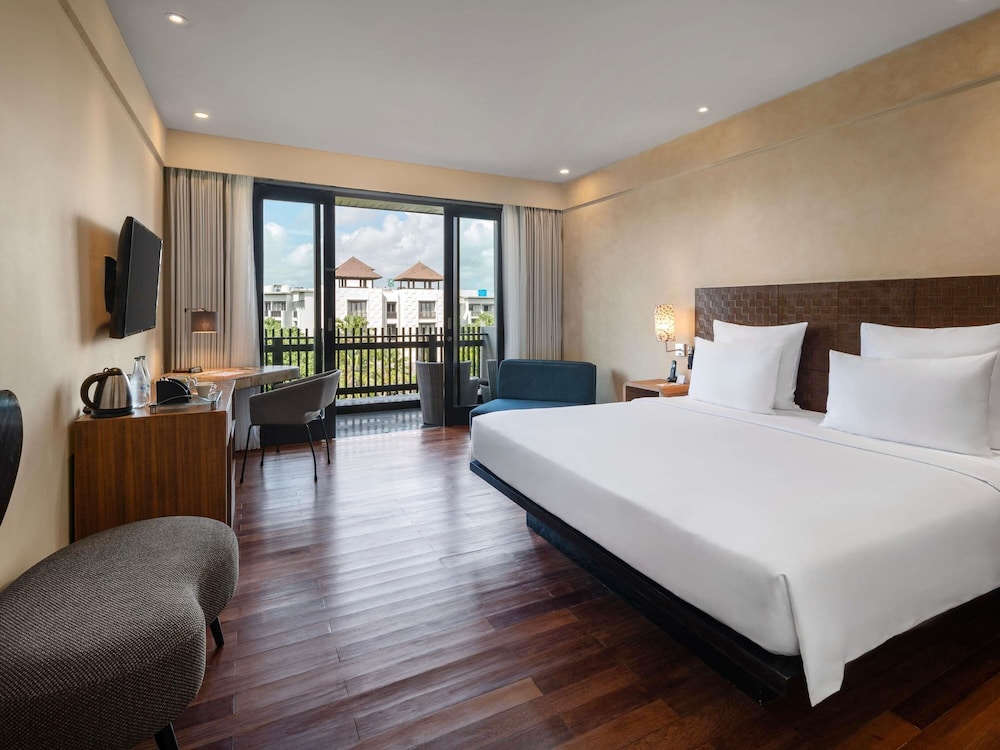 SUITE SUPERIOR, 1 Cama King Size, Vistas al Jardín del hotel Pullman Bali Legian Beach