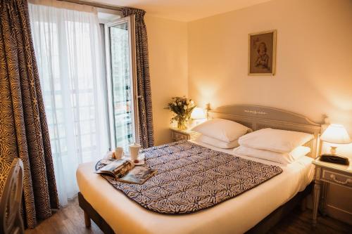 Habitación Doble Estándar del hotel Arcadie Montparnasse. Foto 2