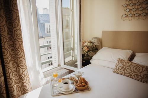 Habitación Doble Estándar del hotel Arcadie Montparnasse. Foto 8