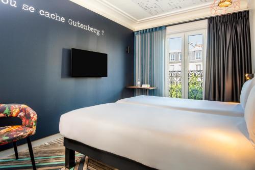 Habitación Doble Estándar - 2 camas del hotel Ibis Styles Paris Gare de Lyon Bastille. Foto 10