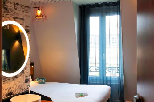 Habitación Doble Estándar del hotel Ibis Styles Paris Gare de Lyon Bastille. Foto 16