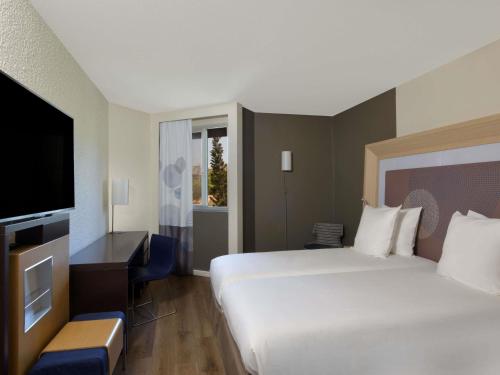 Habitación Doble Estándar con vistas a la ciudad - 2 camas del hotel Novotel Dakar