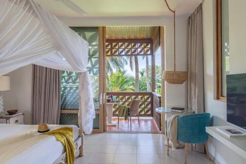 Habitación Meliá con terraza y vistas parciales al océano del hotel Melia Zanzibar. Foto 1