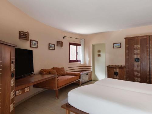 Habitación Doble Estándar - 2 camas del hotel Movenpick Resort Lamantin Saly. Foto 1