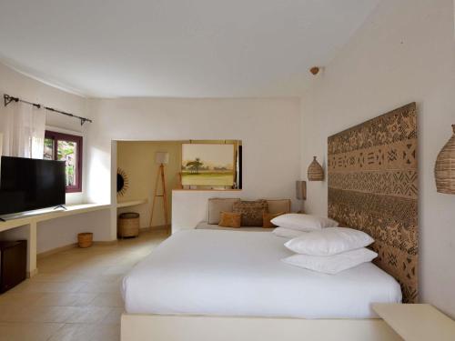 Habitación Doble Estándar del hotel Movenpick Resort Lamantin Saly
