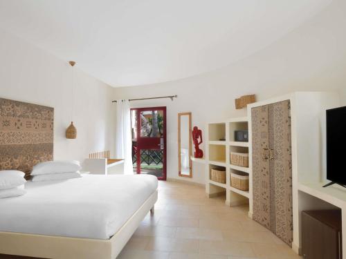 Habitación Doble Estándar del hotel Movenpick Resort Lamantin Saly. Foto 1