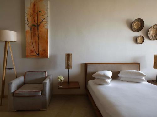 Habitación Familiar - 2 camas grandes del hotel Movenpick Resort Lamantin Saly. Foto 1