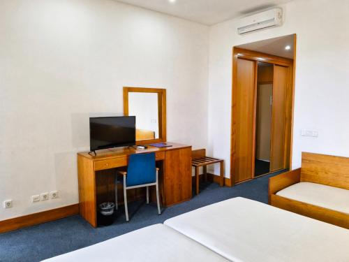 Habitación Triple del hotel Colombo. Foto 5