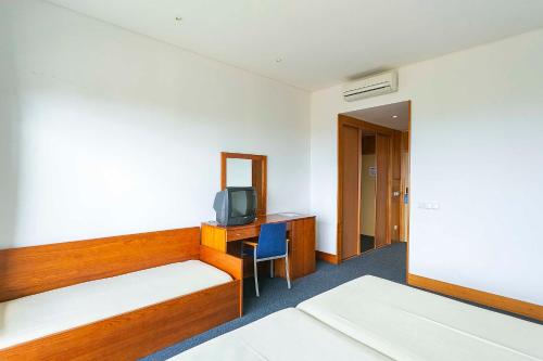 Habitación Triple del hotel Colombo. Foto 3