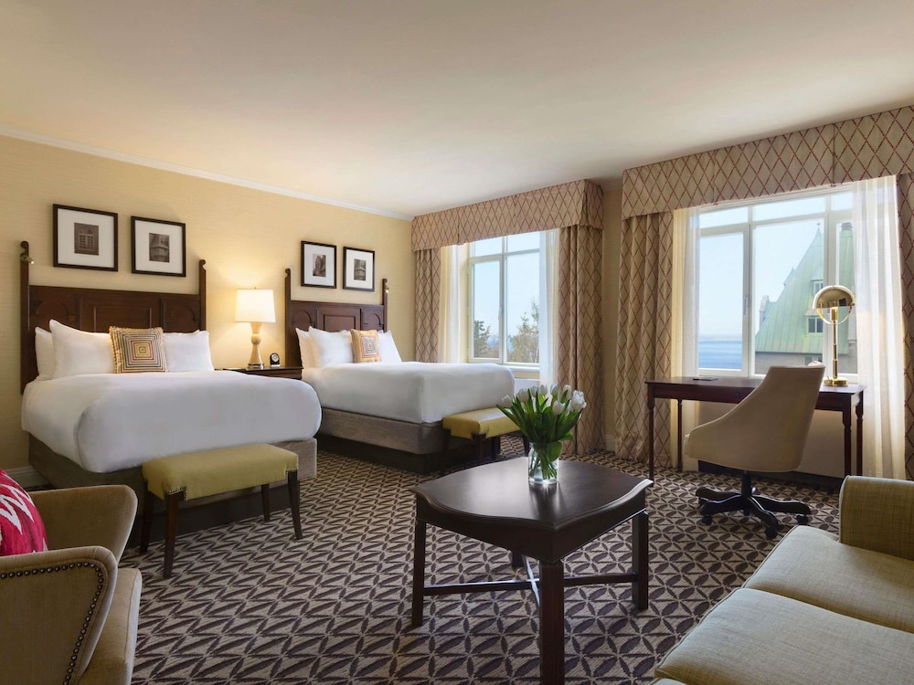 Habitación Deluxe con dos camas dobles del hotel Fairmont Le Manoir Richelieu. Foto 1