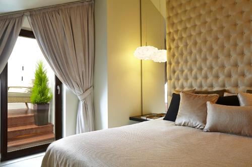 Suite con terraza del hotel 9hotel Mercy. Foto 5