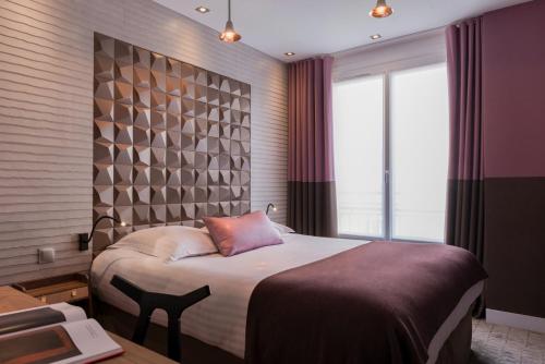 Classic Double Room with Panoramic Sacré - Coeur View del hotel ATALA HOTEL CHAMPS ELYSEES. Foto 2