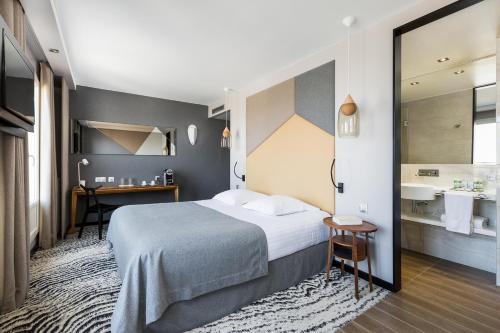 Deluxe Double Room with Panoramic Sacré - Coeur View del hotel ATALA HOTEL CHAMPS ELYSEES. Foto 4
