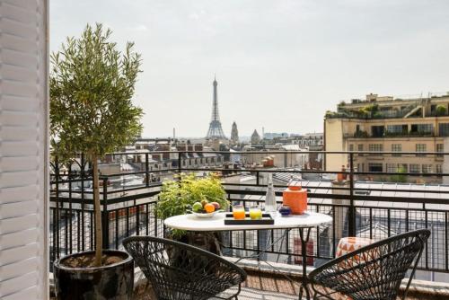 The Iconic Suite - Eiffel Tower View del hotel ATALA HOTEL CHAMPS ELYSEES. Foto 4