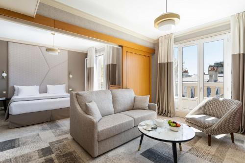 The Timeless Suite - Eiffel Tower View del hotel ATALA HOTEL CHAMPS ELYSEES. Foto 1