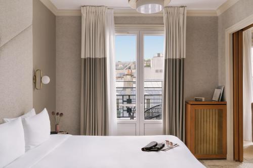 The Timeless Suite - Eiffel Tower View del hotel ATALA HOTEL CHAMPS ELYSEES. Foto 9