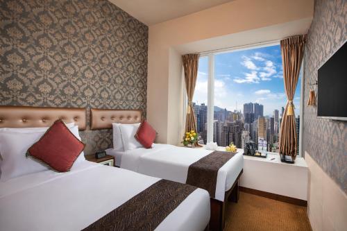 Habitación Estándar con vistas a la ciudad del hotel Ramada by Wyndham Hong Kong Harbour View
