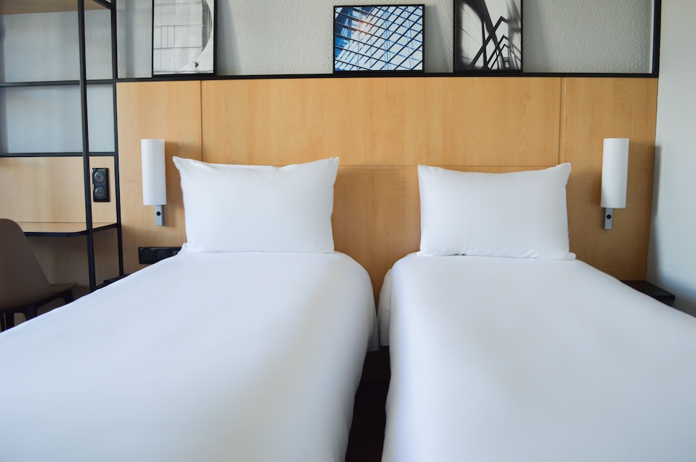 Habitación estándar con 2 camas individuales, 2 camas individuales del hotel Ibis Paris Tour Eiffel Cambronne 15ème. Foto 1