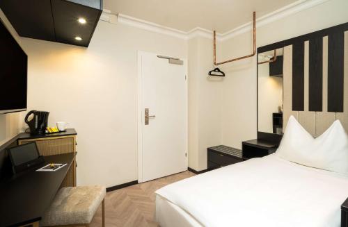Habitación Individual Estándar del hotel Elaya Vienna City Center. Foto 2