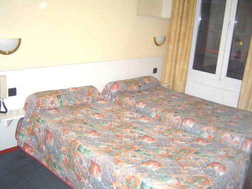 Habitación cuádruple del hotel Ferney République. Foto 3