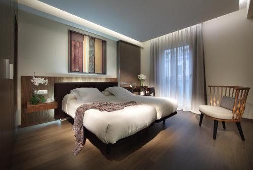 Habitación Triple del hotel BIBO Recogidas