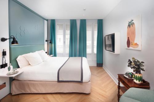 Habitación Doble Superior del hotel Vendome Saint Germain. Foto 1