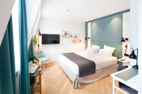 Habitación Doble Superior del hotel Vendome Saint Germain. Foto 7