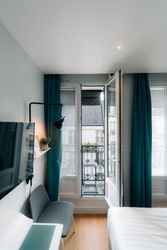 Habitación Doble Estándar del hotel Vendome Saint Germain. Foto 3