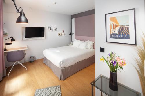 Habitación Doble adaptada para personas con movilidad reducida del hotel Vendome Saint Germain. Foto 2