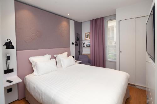 Habitación Doble Pequeña del hotel Vendome Saint Germain. Foto 4