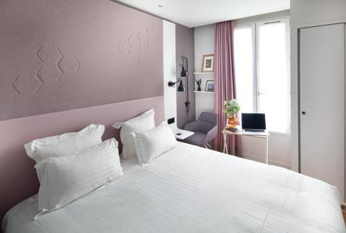 Habitación Doble Pequeña del hotel Vendome Saint Germain. Foto 6