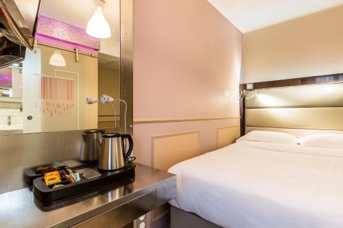 Habitación Doble Estándar del hotel District Republique. Foto 4