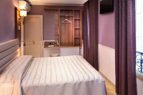 Habitación Triple del hotel Tour Eiffel. Foto 3