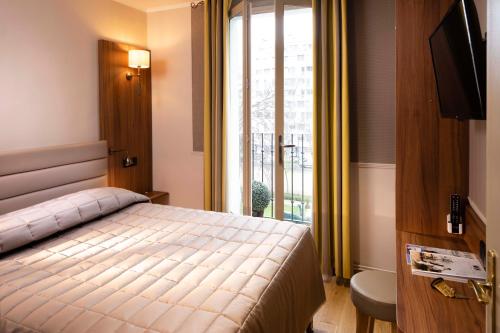 Habitación Cuádruple Confort del hotel Tour Eiffel. Foto 2
