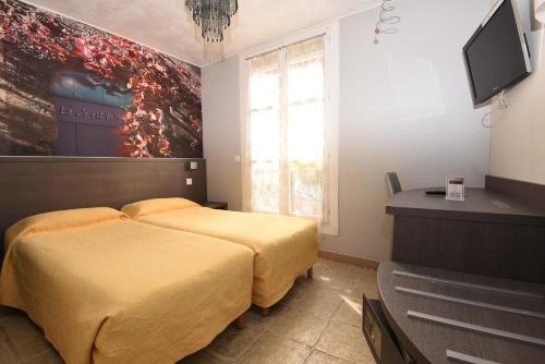 Habitación Doble - 2 camas del hotel AMELIE HOTEL. Foto 3