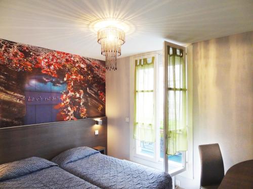 Habitación Doble - 2 camas del hotel AMELIE HOTEL. Foto 4