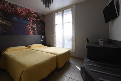 Habitación Doble - 2 camas del hotel AMELIE HOTEL. Foto 6