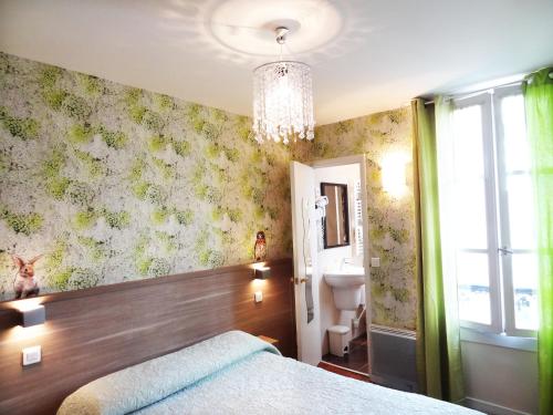 Habitación Doble del hotel AMELIE HOTEL. Foto 6